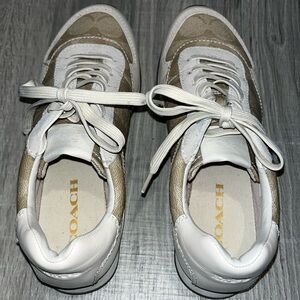 Coach sneakers in a cream color